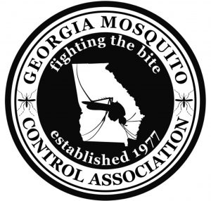 Georgia Mosquito Control Association logo featuring a mosquito silhouette inside a circular black‑and‑white seal with the text ‘Georgia Mosquito Control Association’ and ‘Established 1979.’